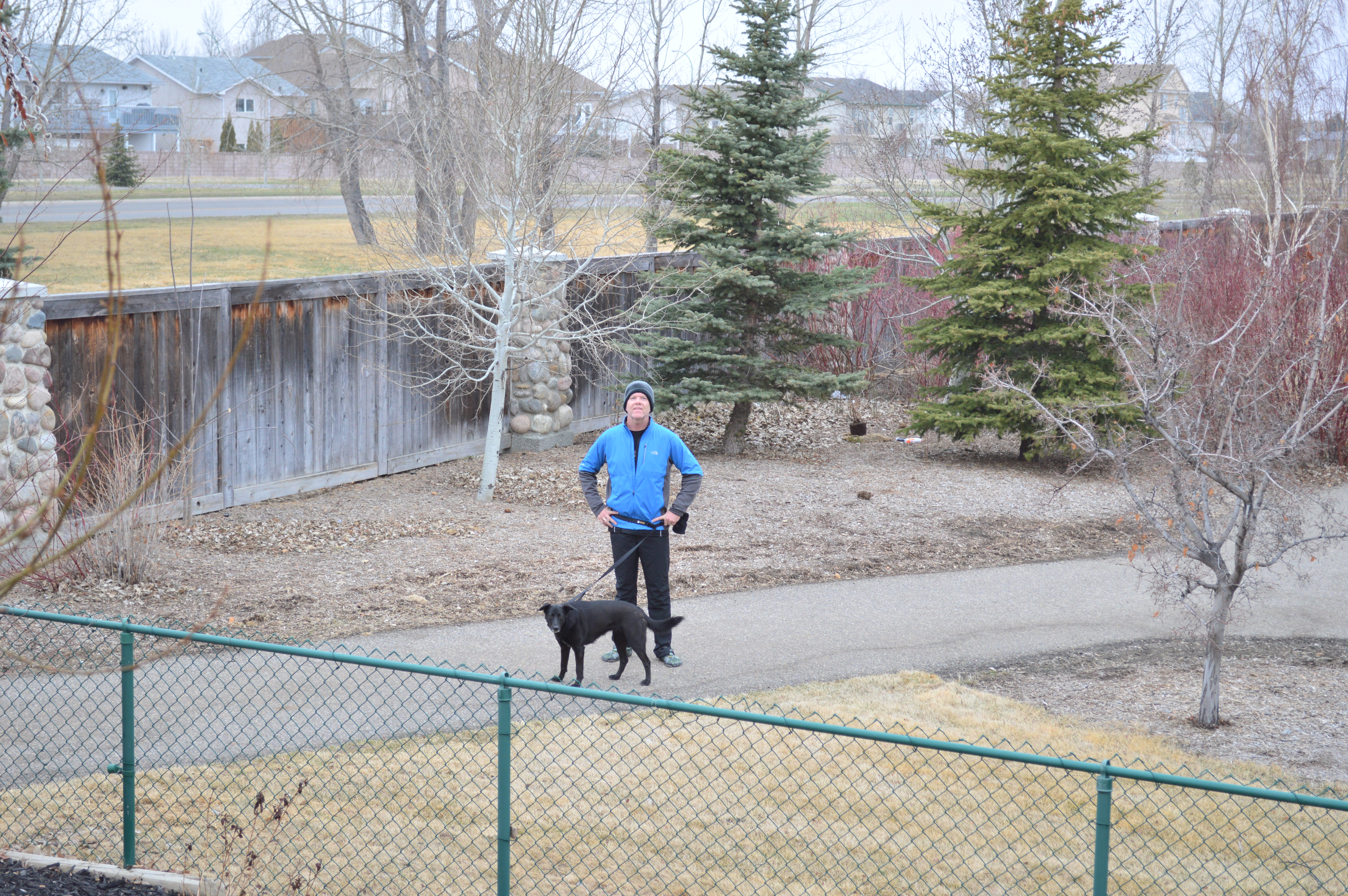 Runner and dog pausing for a photo.
